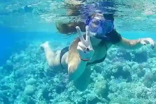 Manolo Tours Egypt professional snorkeling guide in the water.