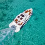 A speedboat cruising the clear waters of Hurghada - Manolo Tours Hurghada